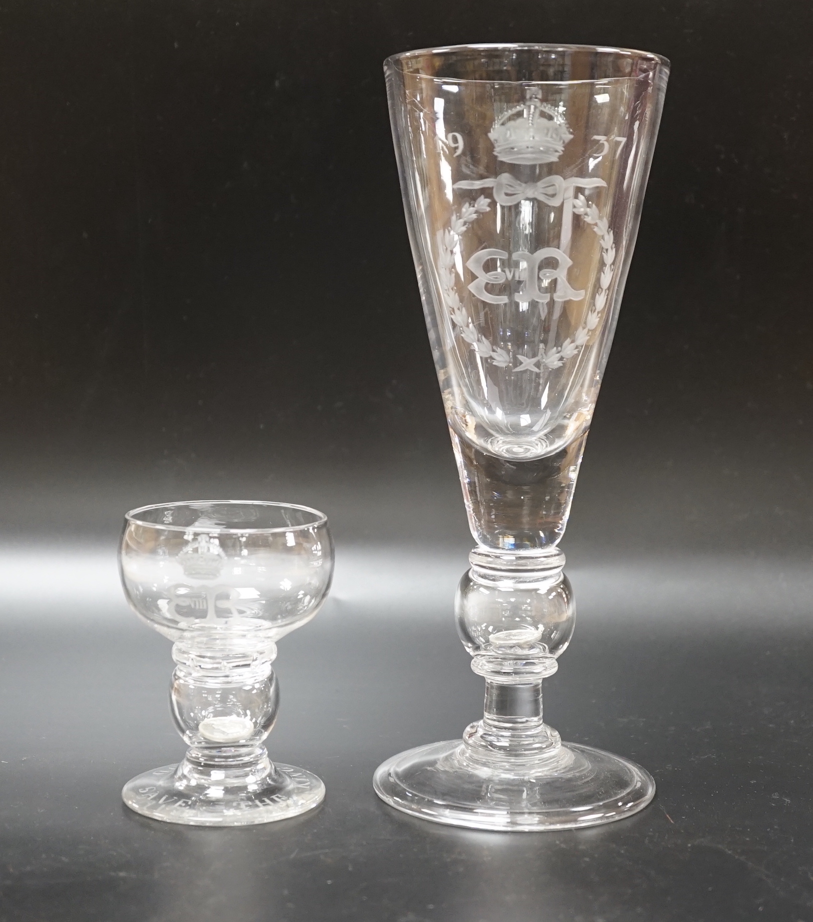 A large Edward VIII commemorative trumpet goblet with etched glass design dated 1937, together with a small commemorative glass with similar etching and ‘God Save The King’ etched around the foot, both with a commemorati